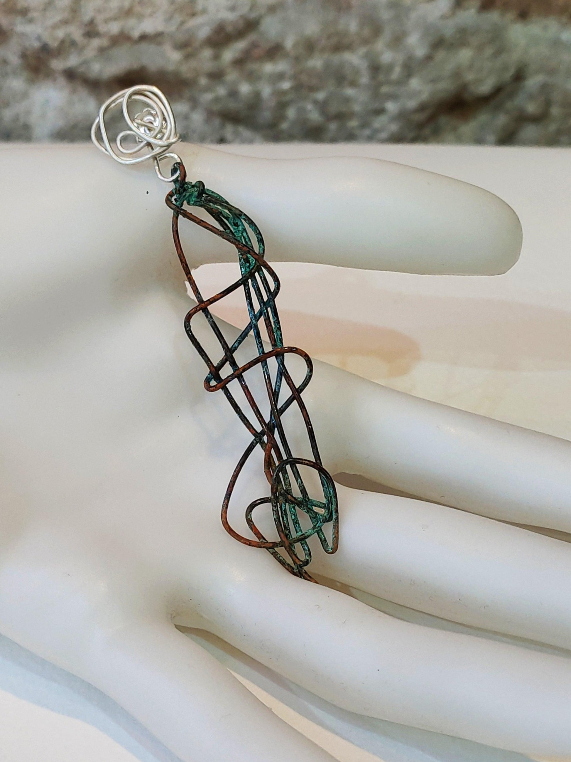 Pendientes hecho a mano de cobre y plata con colores óxido
